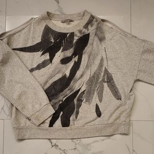 Open shoulder sweatshirt